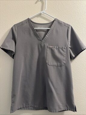 FIGS Women’s Short Sleeve V-Neck Scrub Top in Gray